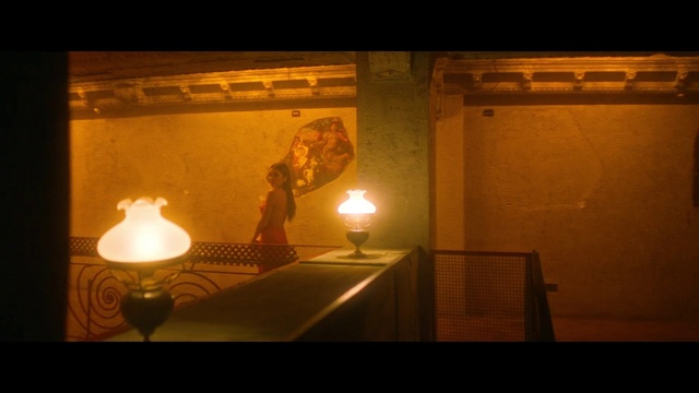 Video Reference: Amber, Wood, Art, Tints and shades, Heat, Ceiling, Glass, Facial hair, Darkness, Lamp