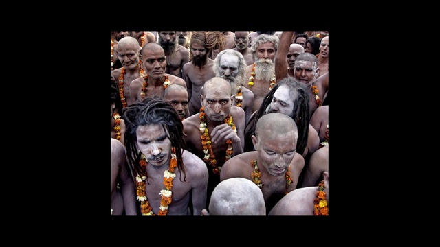 Video Reference: Flash photography, Art, Font, Event, Visual arts, T-shirt, Fictional character, Entertainment, Darkness, Photo caption