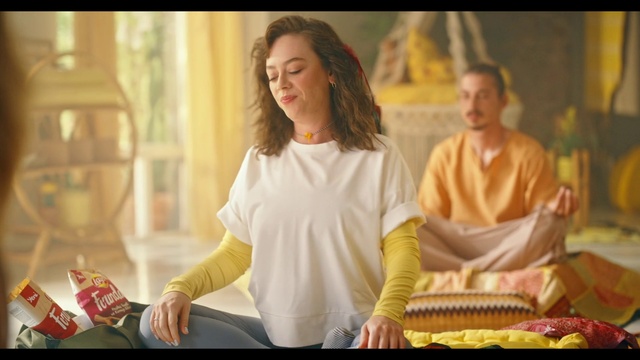 Video Reference: Fashion, Sleeve, Orange, Happy, Leisure, Street fashion, Event, Fun, Sitting, T-shirt