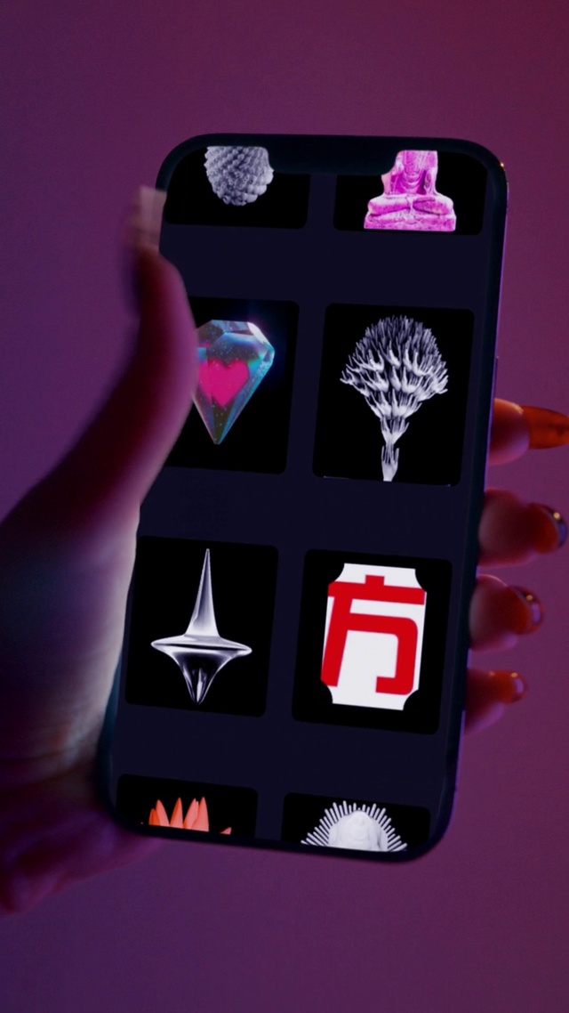 Video Reference: Gesture, Pink, Finger, Font, Material property, Magenta, Drinkware, Logo, Crown, Fashion accessory