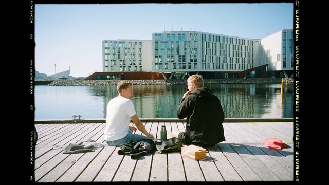 Video Reference: Water, Sky, Building, Window, Outdoor furniture, Urban design, Travel, Rectangle, Line, Wood