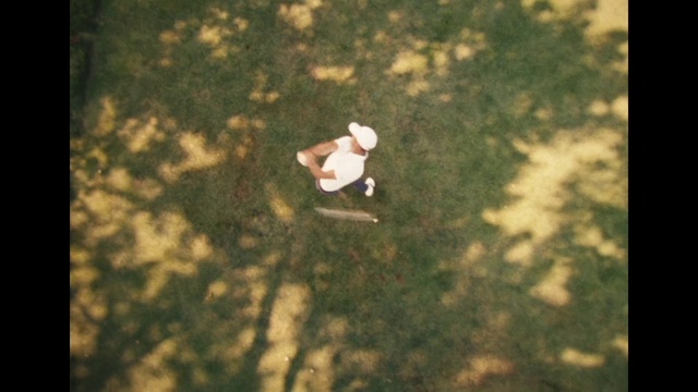 Video Reference: Plant, Branch, Wood, Flash photography, People in nature, Grass, Tints and shades, Font, Tree, Rectangle