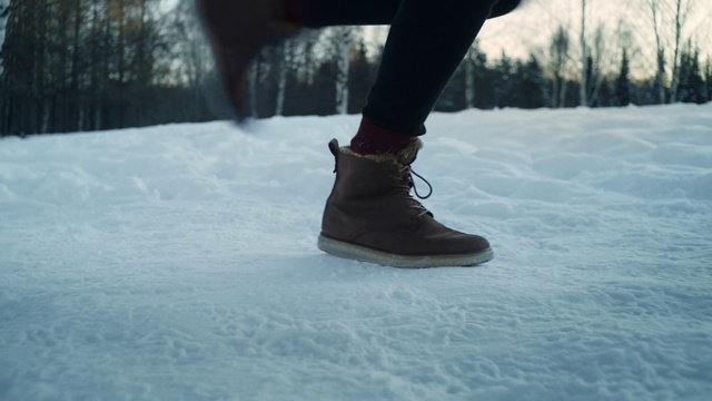Video Reference: Footwear, Shoe, Cloud, Leg, Snow, Sky, People in nature, Street fashion, Dress, Grey
