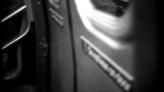 Video Reference: Automotive lighting, Grey, Automotive tire, Font, Tints and shades, Automotive design, Personal luxury car, Darkness, Vehicle door, Monochrome photography