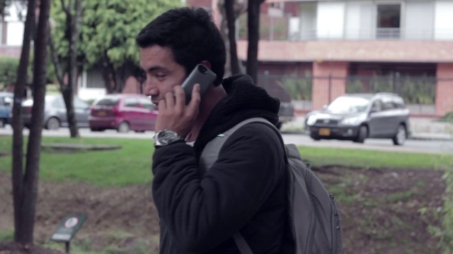 Video Reference: Forehead, Facial expression, Wheel, Tire, Smile, Mammal, Gesture, Street fashion, Car, Tree