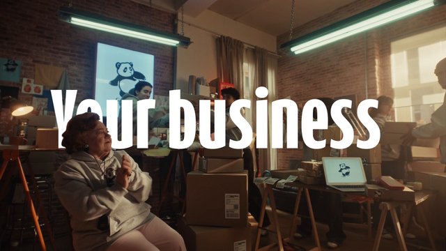 Video Reference: office, studio, people, boxes, packing, startup, team, laptop, interior, workspace, text overlay, brand graphic, brick wall, window light, cards, delivery