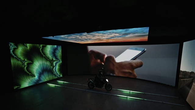 Video Reference: Automotive design, Gadget, Table, Display device, Rectangle, Electronic device, Space, Darkness, Event, Wood