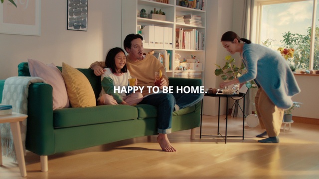 Video Reference: Picture frame, Couch, Furniture, Smile, Comfort, Bookcase, Table, Sharing, Floor, Living room