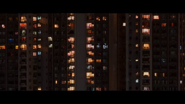 Video Reference: Building, Rectangle, Window, Skyscraper, Tower block, Amber, Condominium, Urban design, Residential area, Font