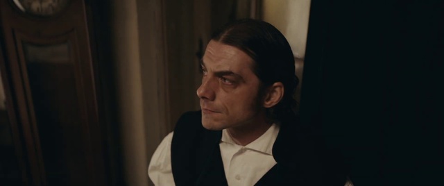 Video Reference: Forehead, Cheek, Dress shirt, Collar, Blazer, Formal wear, Event, White-collar worker, Official, Pleased