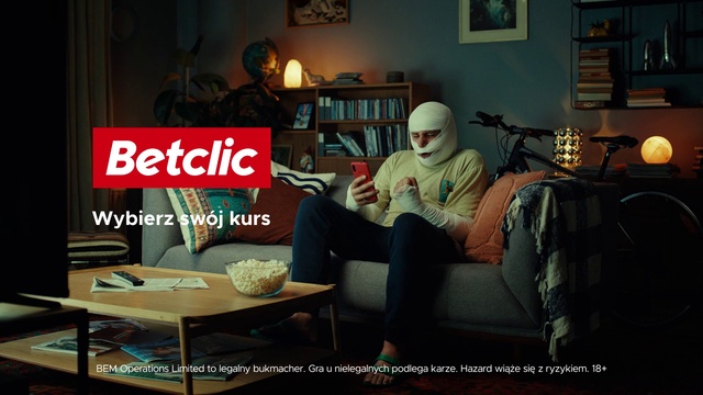 Video Reference: Picture frame, Furniture, Hat, Comfort, Couch, Musical instrument, Table, Microphone, Lamp, Interior design