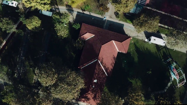 Video Reference: Plant, Building, Land lot, Urban design, Landscape, Wood, House, City, Roof, Slope