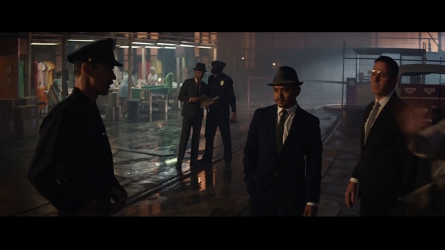 Video Reference: Hat, Entertainment, Event, Fun, Suit, Art, City, Sun hat, Darkness, Tie