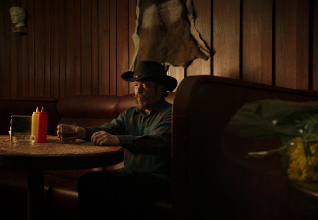Video Reference: Hat, Sun hat, Lighting, Table, Flash photography, Tints and shades, Darkness, Sitting, Fun, Facial hair