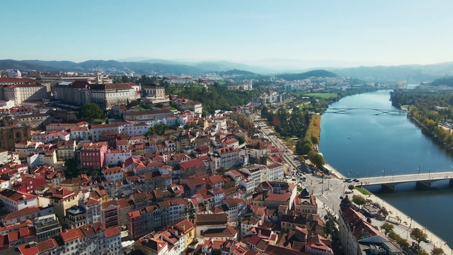 Video Reference: Sky, Water, Building, Urban design, Cityscape, Residential area, House, Landscape, Real estate, Metropolitan area