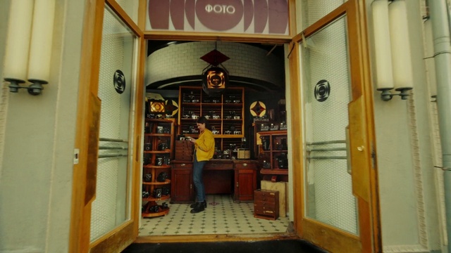 Video Reference: Property, Door, Wood, Building, Fixture, Home door, Shelf, House, Flooring, Picture frame