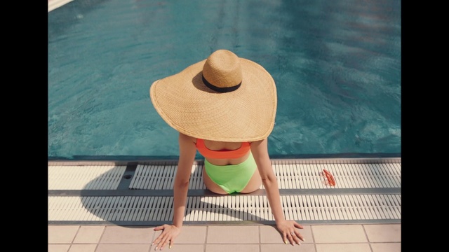 Video Reference: Water, Hat, Sun hat, Rectangle, Outdoor furniture, Headgear, Wood, Leisure, Flooring, Tints and shades