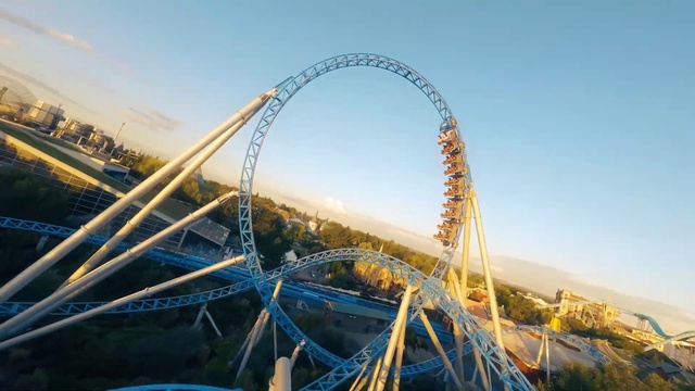 Video Reference: Sky, Cloud, Outdoor recreation, Leisure, Recreation, Fun, Water, Grass, Tree, Roller coaster