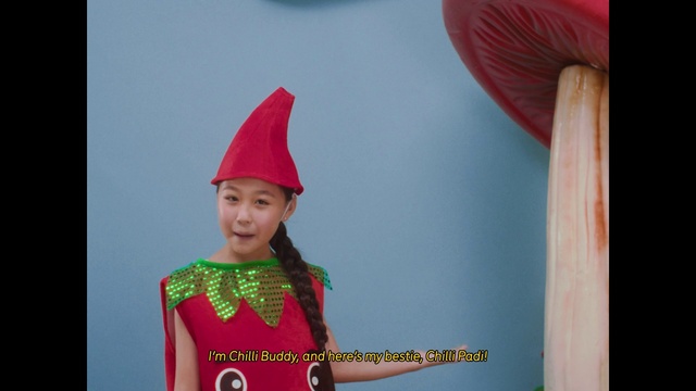 Video Reference: Sleeve, Headgear, Entertainment, Happy, Fashion design, Magenta, Costume hat, Cap, Event, Electric blue