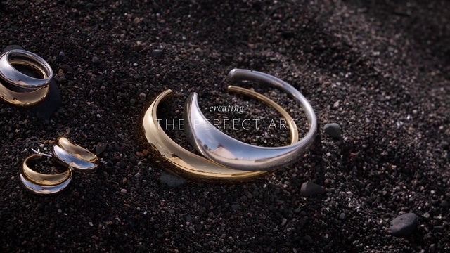 Video Reference: Body jewelry, Wood, Natural material, Font, Jewellery, Wedding ceremony supply, Eyewear, Circle, Electric blue, Bracelet