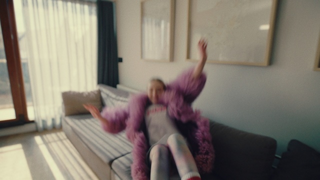 Video Reference: Shoulder, Comfort, Window, Gesture, Thigh, Knee, Curtain, Couch, Living room, Flooring