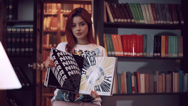 Video Reference: Bookcase, Shelf, Fashion, Sleeve, Waist, Book, Tartan, Publication, Thigh, Shelving