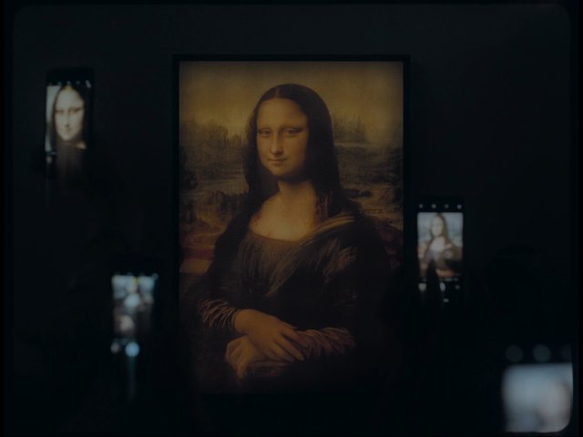 Video Reference: mona lisa, painting, art, museum, display, dark background, portrait, louvre, screen, thumbnail, gallery, renaissance