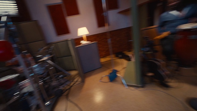 Video Reference: Wood, Flooring, Floor, Couch, Audio equipment, Hardwood, Living room, Event, Laminate flooring, Wood flooring