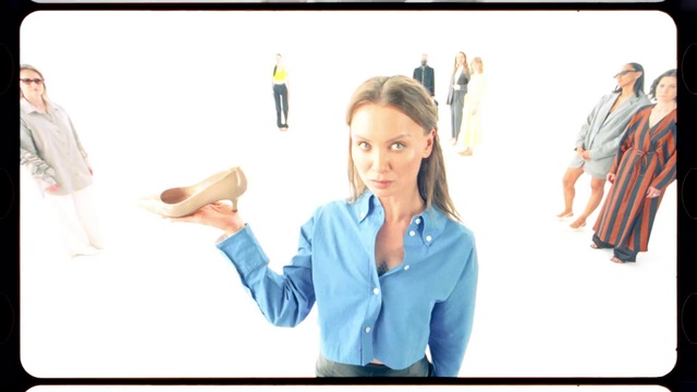 Video Reference: Joint, Outerwear, Fashion, Sleeve, Gesture, Blazer, Fashion design, Elbow, Technology, Electronic device