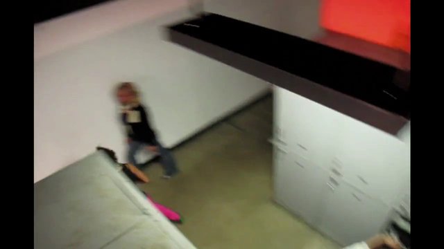 Video Reference: indoor, room, bed, cabinet, hallway, person, blurred, overhead, interior, home, doorway, motion blur