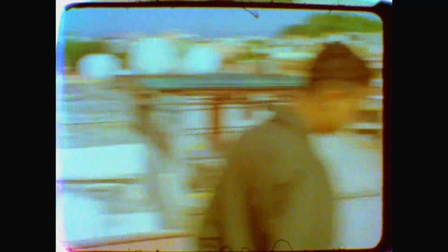 Video Reference: blurred, indoor, person, motion, abstract, lowlight, interior, figure, motion blur, unfocused, vintage, color cast