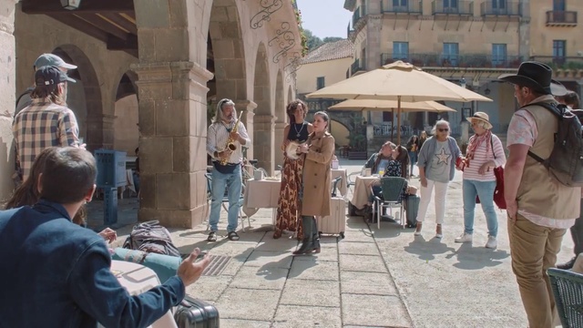 Video Reference: Hat, Temple, Luggage and bags, Sunglasses, Bag, Building, City, Handbag, Chair, Urban area