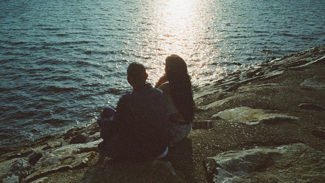 Video Reference: Water, People in nature, Flash photography, Standing, Gesture, Lake, Sunlight, Happy, Coastal and oceanic landforms, Horizon