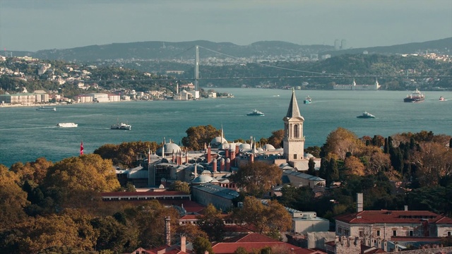 Video Reference: Water, Sky, Daytime, Boat, Building, Azure, Watercraft, Coastal and oceanic landforms, Tree, Lake