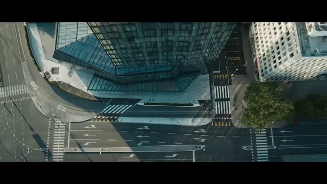 Video Reference: Building, Urban design, Tower, Facade, City, Tower block, Road, Commercial building, Glass, Mixed-use