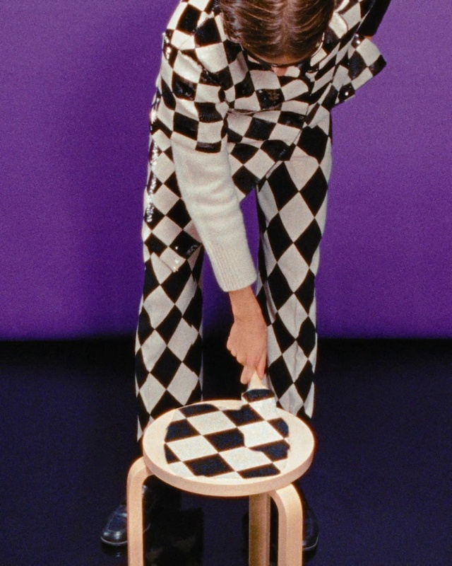 Video Reference: Hair, Arm, Shoulder, White, Purple, Human body, Tartan, Eyewear, Neck, Street fashion