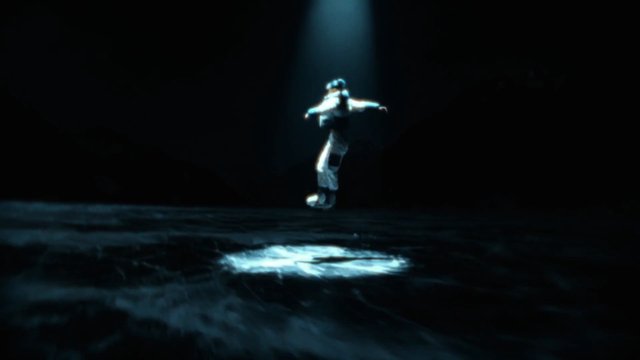 Video Reference: performer, stage, spotlight, dark background, theater, dance, solo, reflection, dramatic lighting, blue light, performance, artistic, music video, silhouette