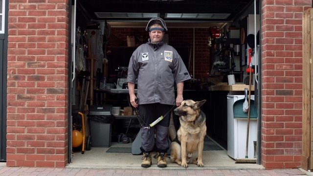 Video Reference: Dog, Carnivore, German shepherd dog, Brickwork, Brick, Workwear, Door, Gas, Security, Old german shepherd dog