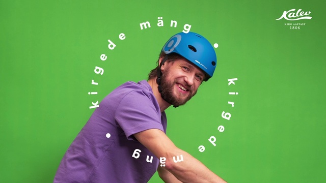 Video Reference: Smile, Helmet, Shirt, Green, Sports equipment, Sports gear, Sleeve, Cap, Sports uniform, Beard