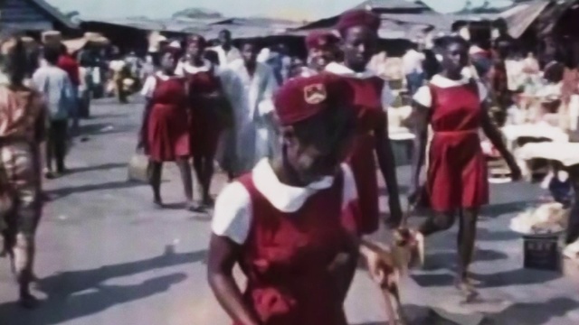 Video Reference: Crowd, Travel, Event, City, Thigh, Road, Recreation, Fun, Hat, Pedestrian