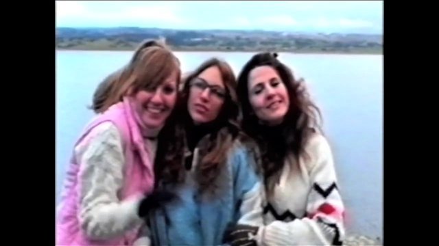 Video Reference: women, friends, group portrait, outdoors, water, lake, smiling, casual clothing, portrait, travel, nature, vintage video