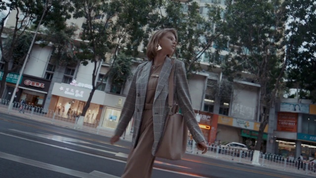 Video Reference: Waist, Street fashion, Tree, Eyewear, Road surface, Blazer, City, Art, Formal wear, Road