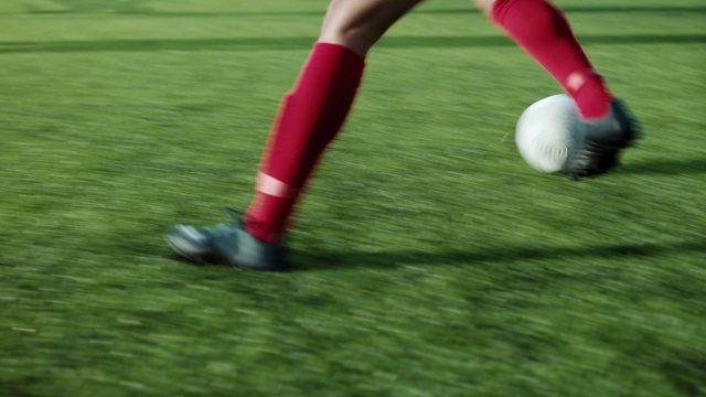 Video Reference: Sports equipment, Playing sports, Football, Ball, Player, Sports gear, Shorts, Sportswear, Sock, Soccer ball