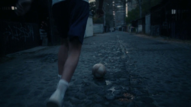 Video Reference: Atmosphere, Shorts, Leg, Flash photography, Football, Asphalt, Road surface, Soccer, Ball, Knee