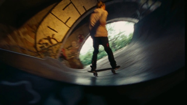 Video Reference: Human body, Flash photography, Rolling, Sports equipment, Tints and shades, Recreation, Circle, Darkness, Human leg, Concrete