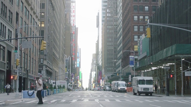 Video Reference: Building, Daytime, Car, Window, Sky, Vehicle, Wheel, Tire, Infrastructure, Road surface