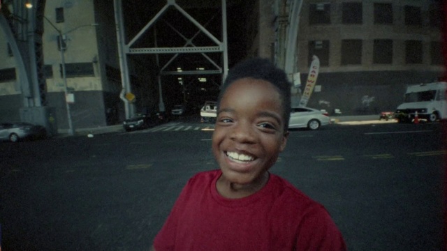 Video Reference: Head, Smile, Car, Automotive lighting, Window, Flash photography, Gesture, Road surface, Asphalt, Happy