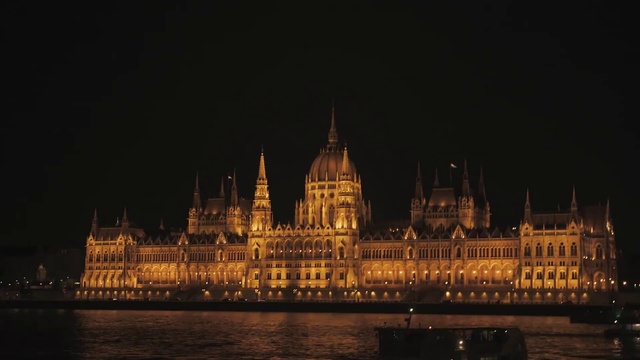 Video Reference: Water, Building, Sky, City, Midnight, Facade, Human settlement, Government, Darkness, Cityscape