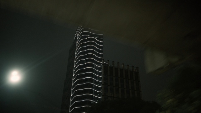 Video Reference: Building, Sky, Skyscraper, Tower block, Tower, Electricity, Tints and shades, City, Midnight, Condominium