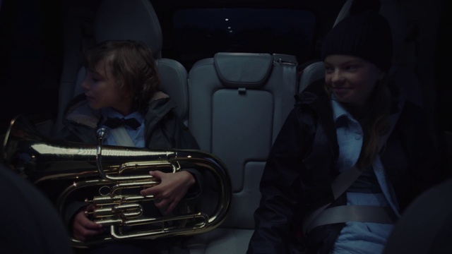 Video Reference: Musical instrument, Brass instrument, Musician, Wind instrument, Head restraint, Music, Woodwind instrument, Entertainment, Car seat, Vehicle door